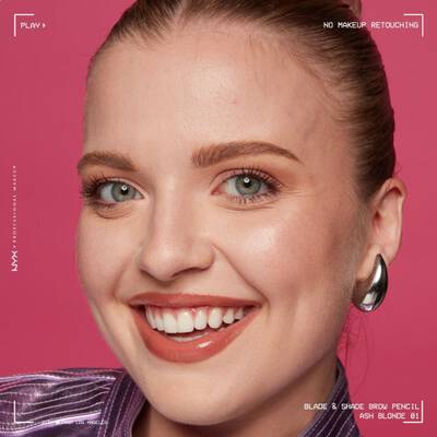 A close-up shot of a young woman with 90s thin eyebrows.