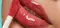 Close-up of model showcasing how to keep lips moisturised using NYX Fat Oil Lip Drip