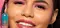 Close-up of a model’s face showcasing NYX Lip IV Hydrating Gloss Stain