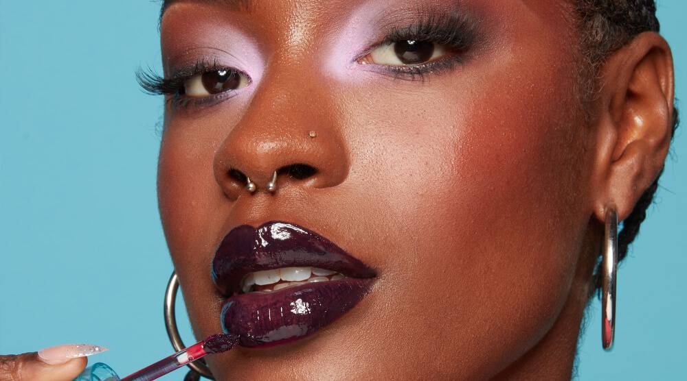Close-up of a model wearing high-shine lip gloss.